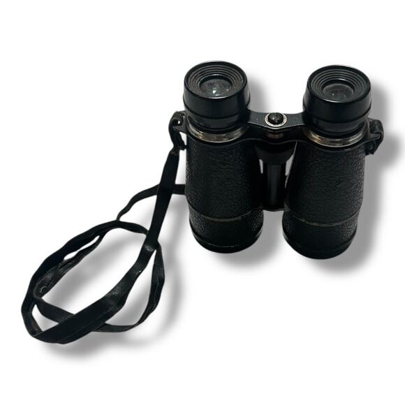 Compact Black Binoculars with Textured Grip and Central Hinge - Picture 2 of 5